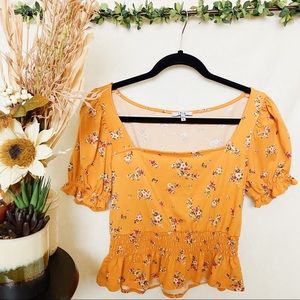Yellow floral peplum top